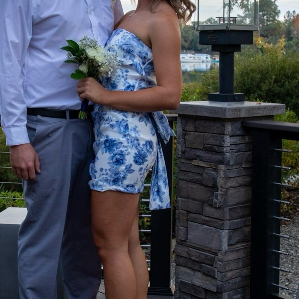 Blue and White Floral Strapless Dress with bow on the back.